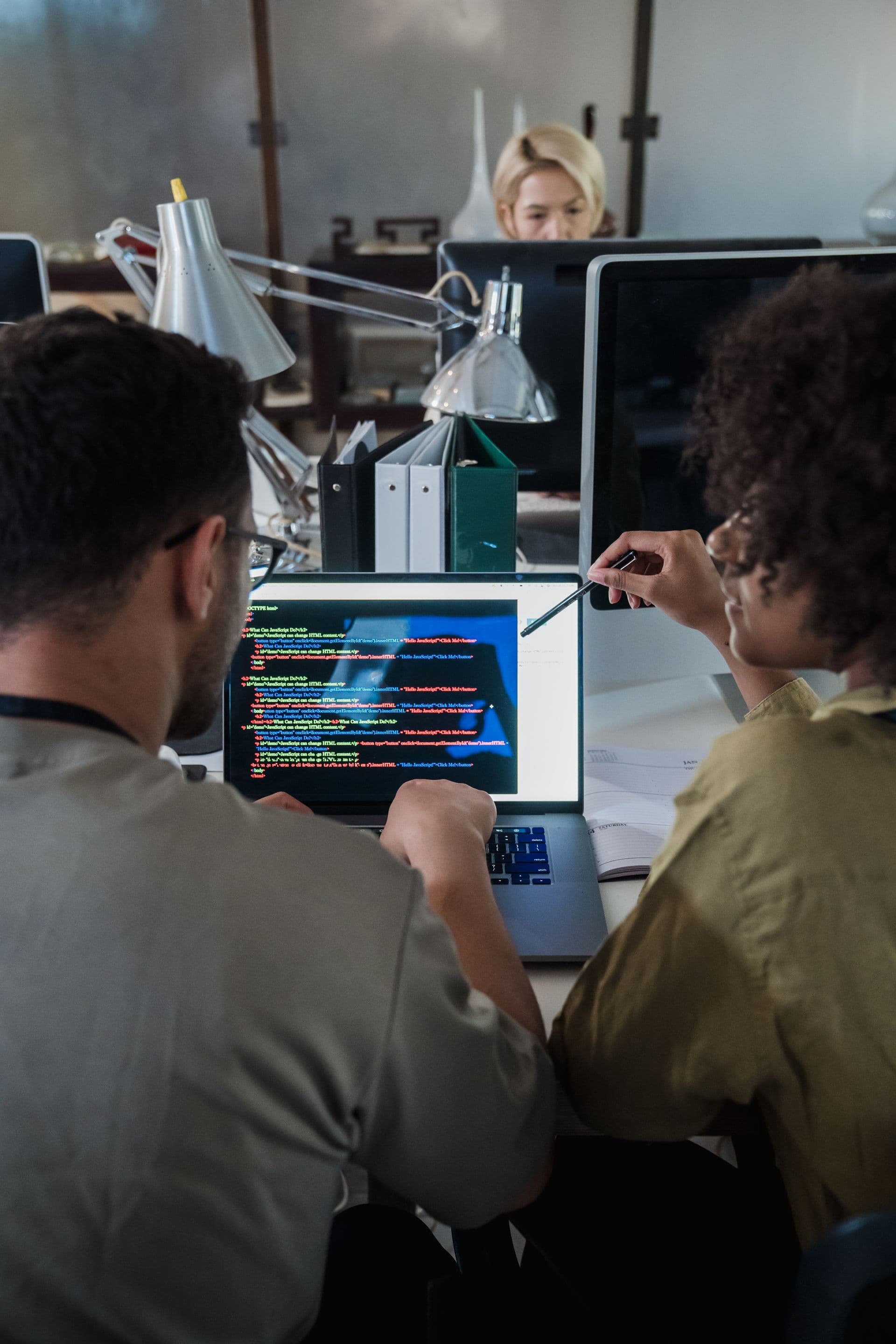 Developers working on a web application