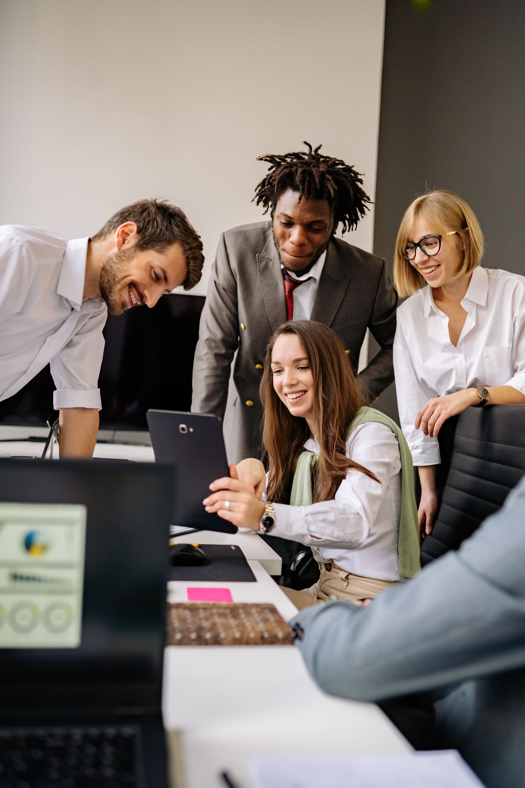 A technology team planning together around a table